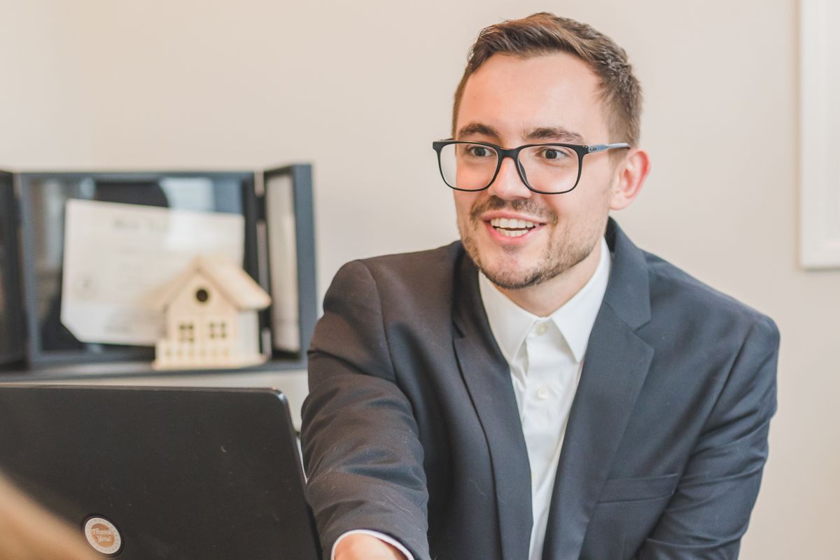Estate agent meeting a client in the office